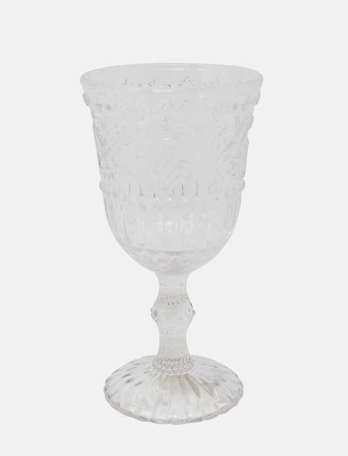 Verre sur pied texturé clair