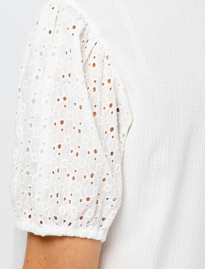 Blouse unie texturée à col chemisier