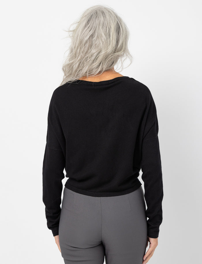 Chandail en tricot avec noeud