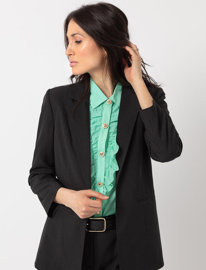 Chemise transparente à volants