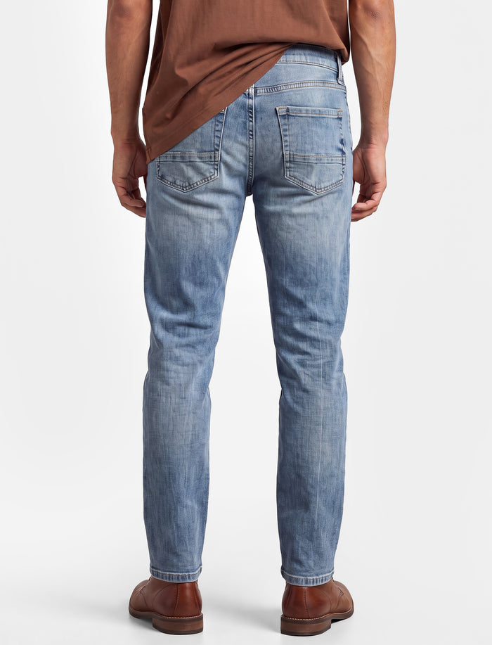 Jean en denim délavé pour homme