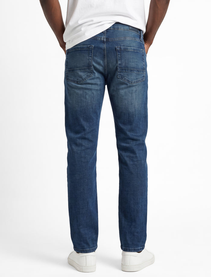 Jean en denim délavé pour homme