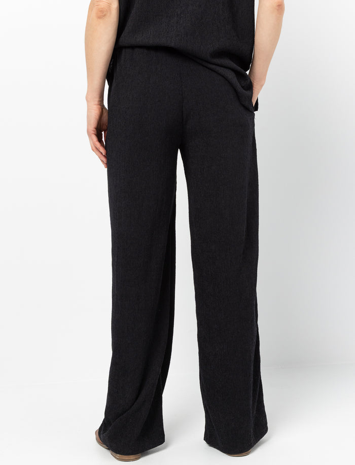 Pantalon texturé à jambes larges