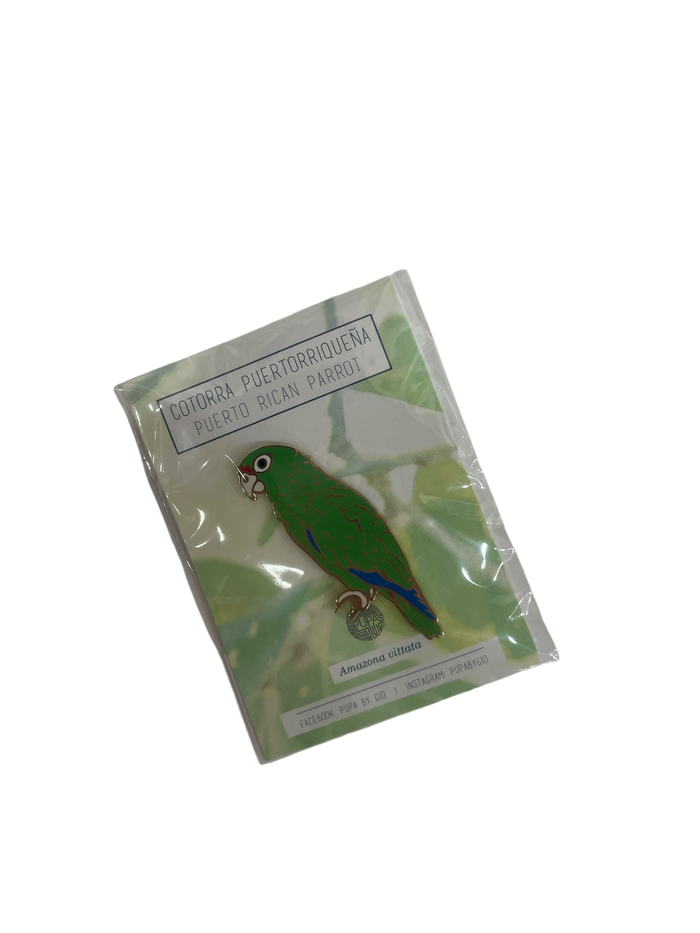 A. Cotorra Puertorriquena/Iguaca/Puertorrican Parrot